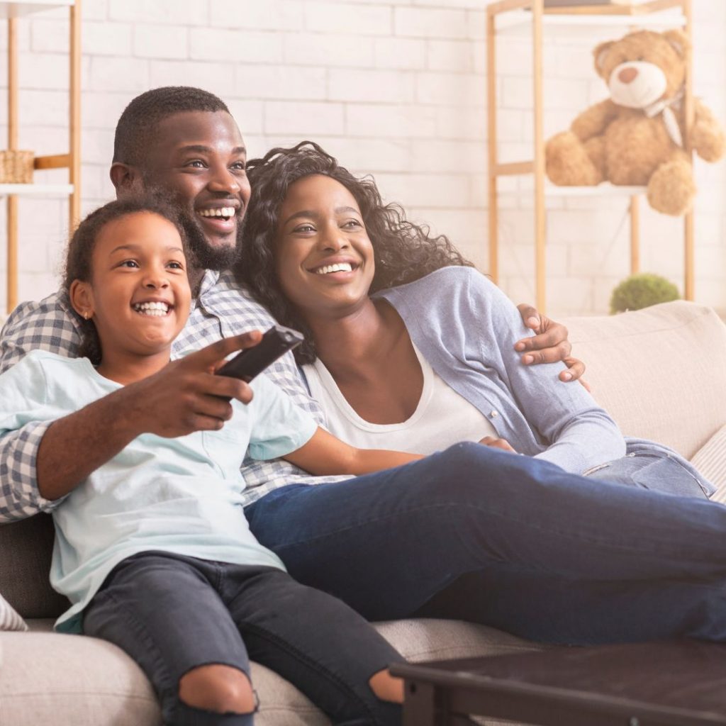 black family watching TV