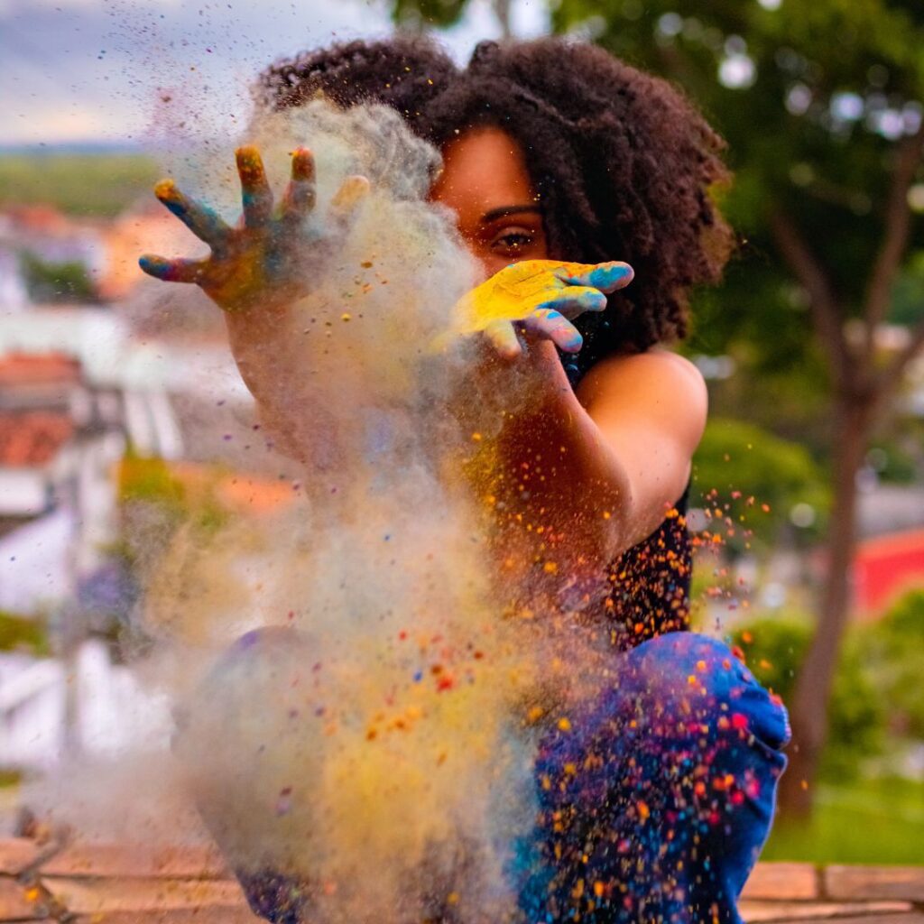img of an African American woman doing art