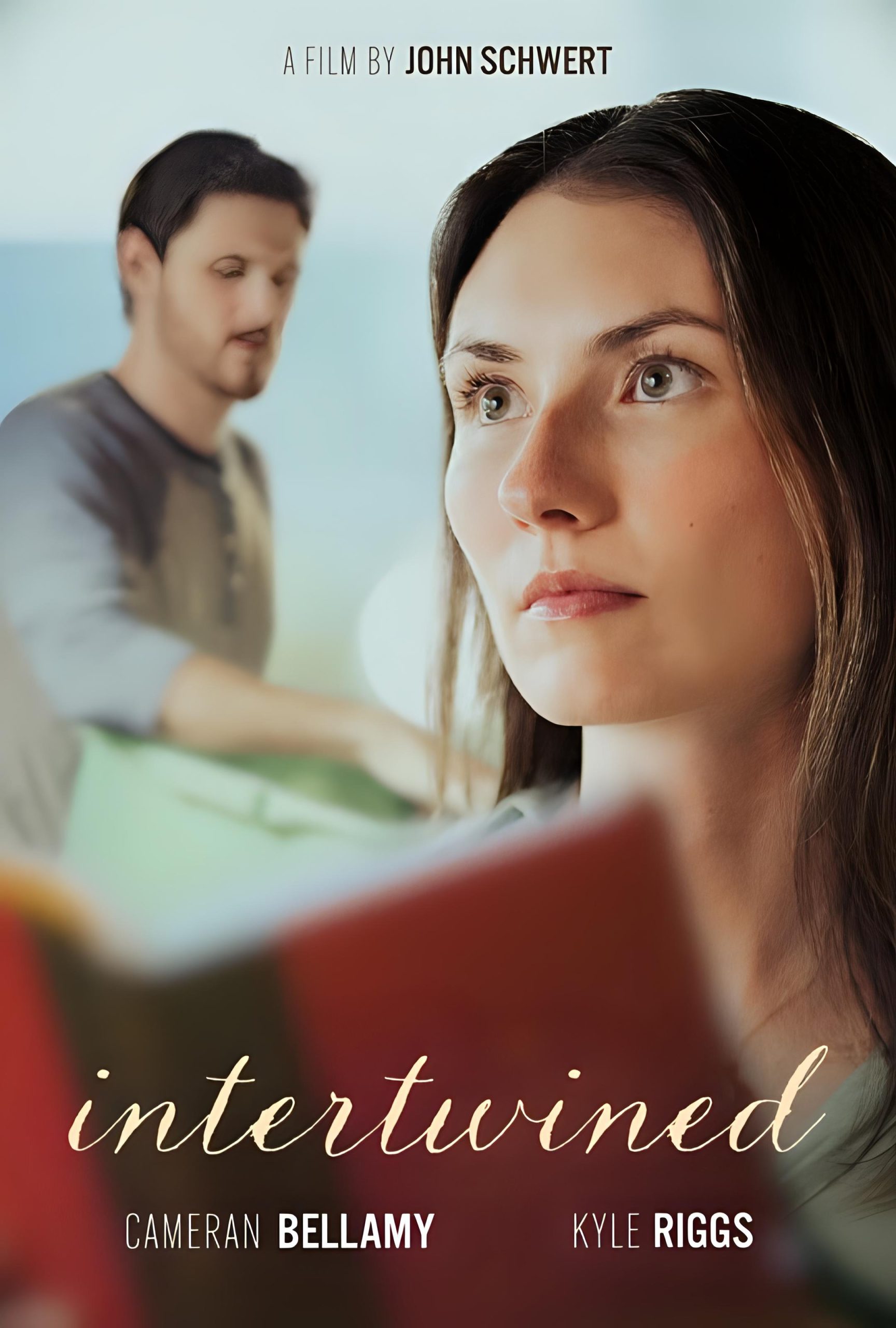 Official poster for Intertwined, a 2026 PVIFF finalist short film directed by John Schwert and starring Cameran Bellamy and Kyle Riggs.